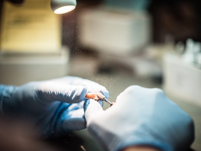 Widex Schleifen von Gehörmaschinen